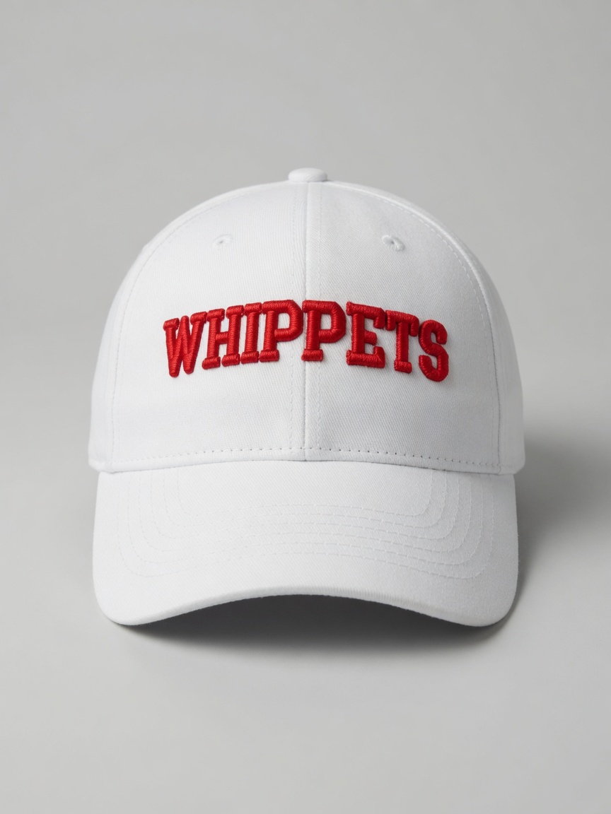 White baseball cap with Whippets embroidered across the front in bold red block lettering.
